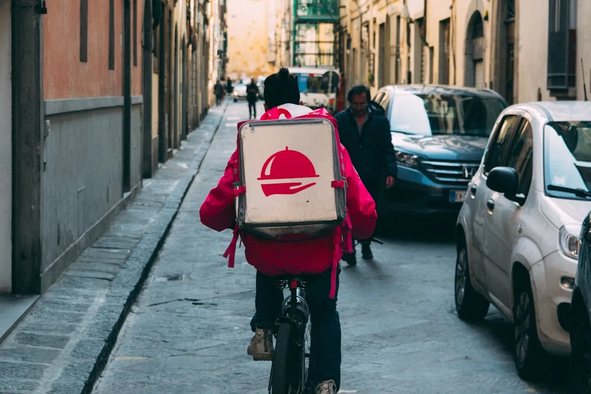 Branded restaurant delivery ordering app showing live order tracking